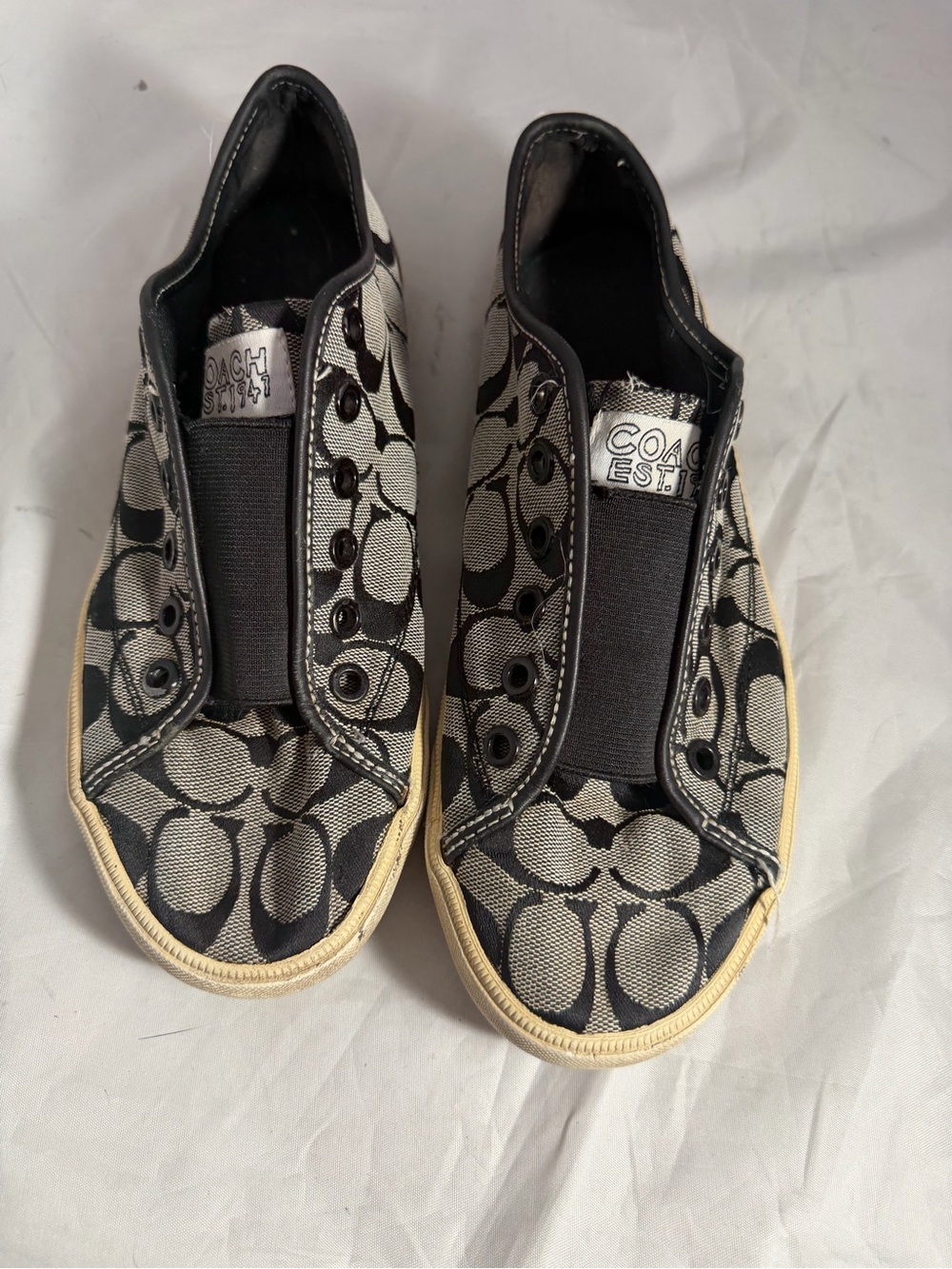 Coach Women’s Slip-On Sneakers in Black and Beige Signature Canvas